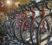 Close-up of a bicycle wheel and tyre in a storage cradle